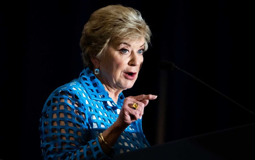 Linda McMahon introduces Donald Trump at the America First Policy Institute's agenda summit in 2022