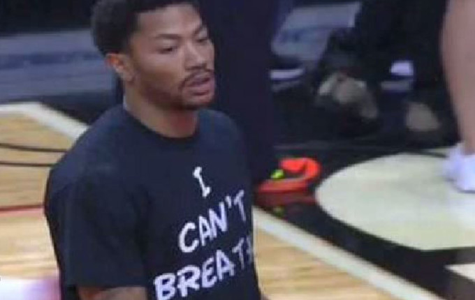 Chicago Bulls guard Derrick Rose stands on the court during the