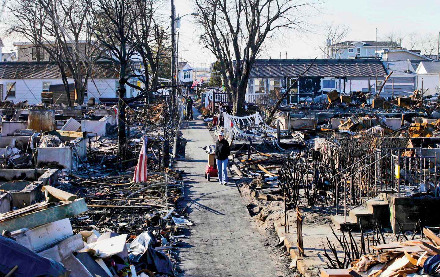 The wreckage: A street in Breezy Point, a section of the Rockaways, two weeks after Sandy.