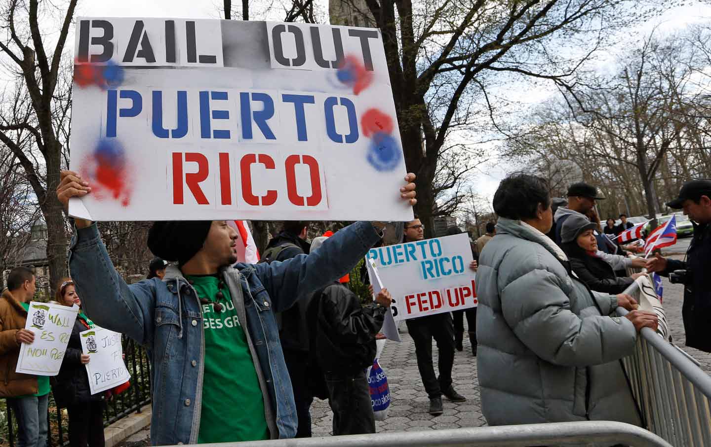 A demonstrator supports bailing out Puerto Rico