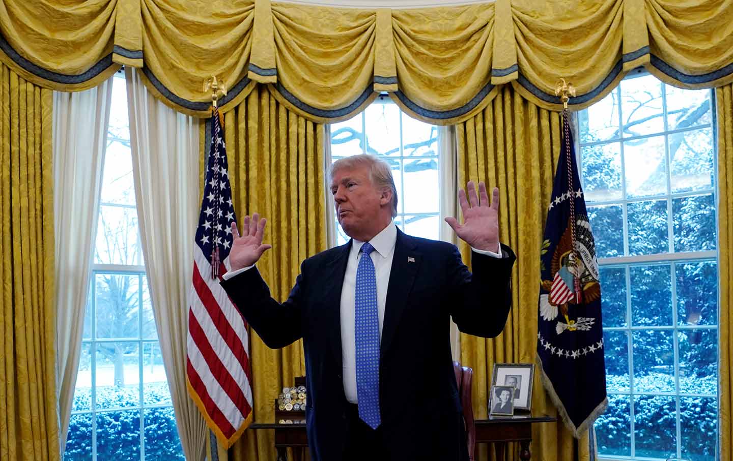 Trump Oval Office Hands Raised