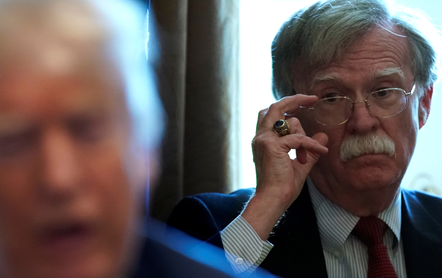 John Bolton at a cabinet meeting with Donald Trump