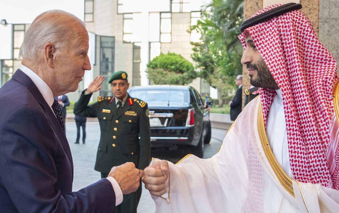 Joe Biden, left, fist bumps with Saudi Arabian Crown Prince Mohammed bin Salman at the Royal Palace.