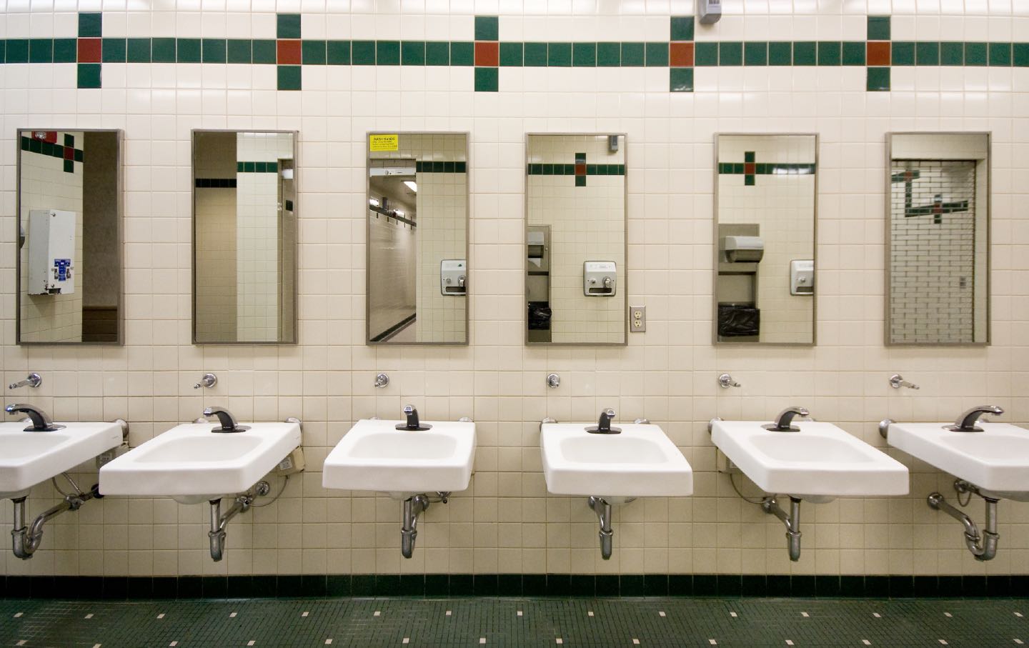 photo of a bathroom, mirrors on walls