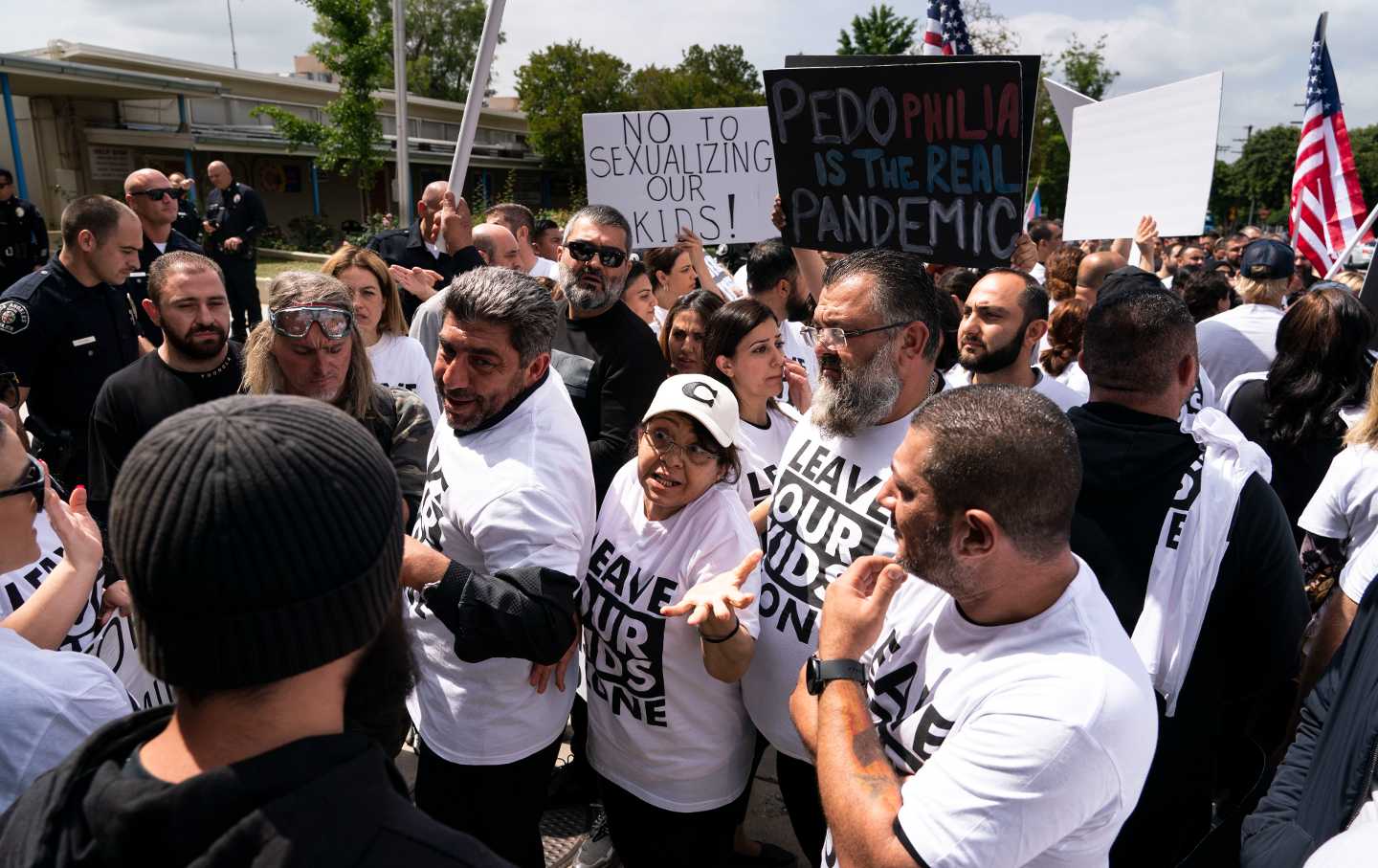 People protesting a planned Pride month assembly argue with counterprotesters outside Saticoy Elementary School in Los Angeles, Friday, June 2, 2023.