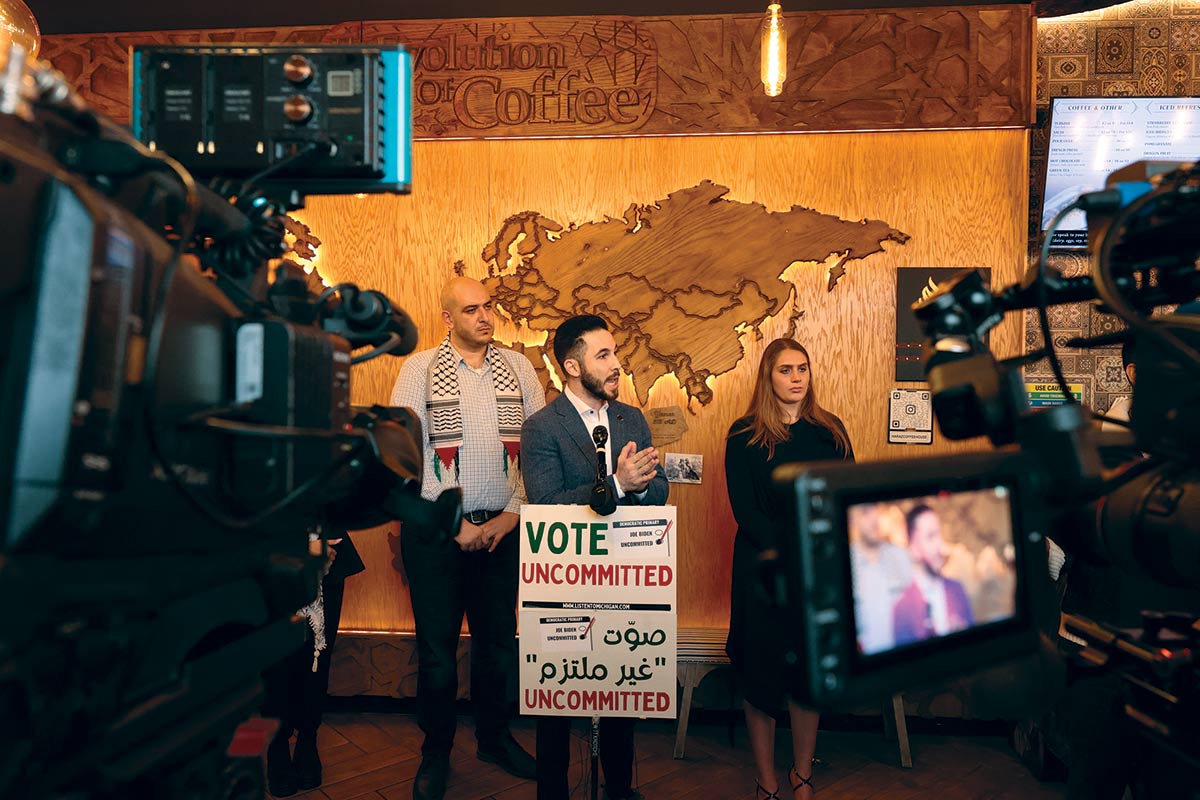 Mayor of Dearborn, Michigan, Abdullah Hammound (center) speaks to the press about the impact of the uncommitted vote after the Michigan primary.
