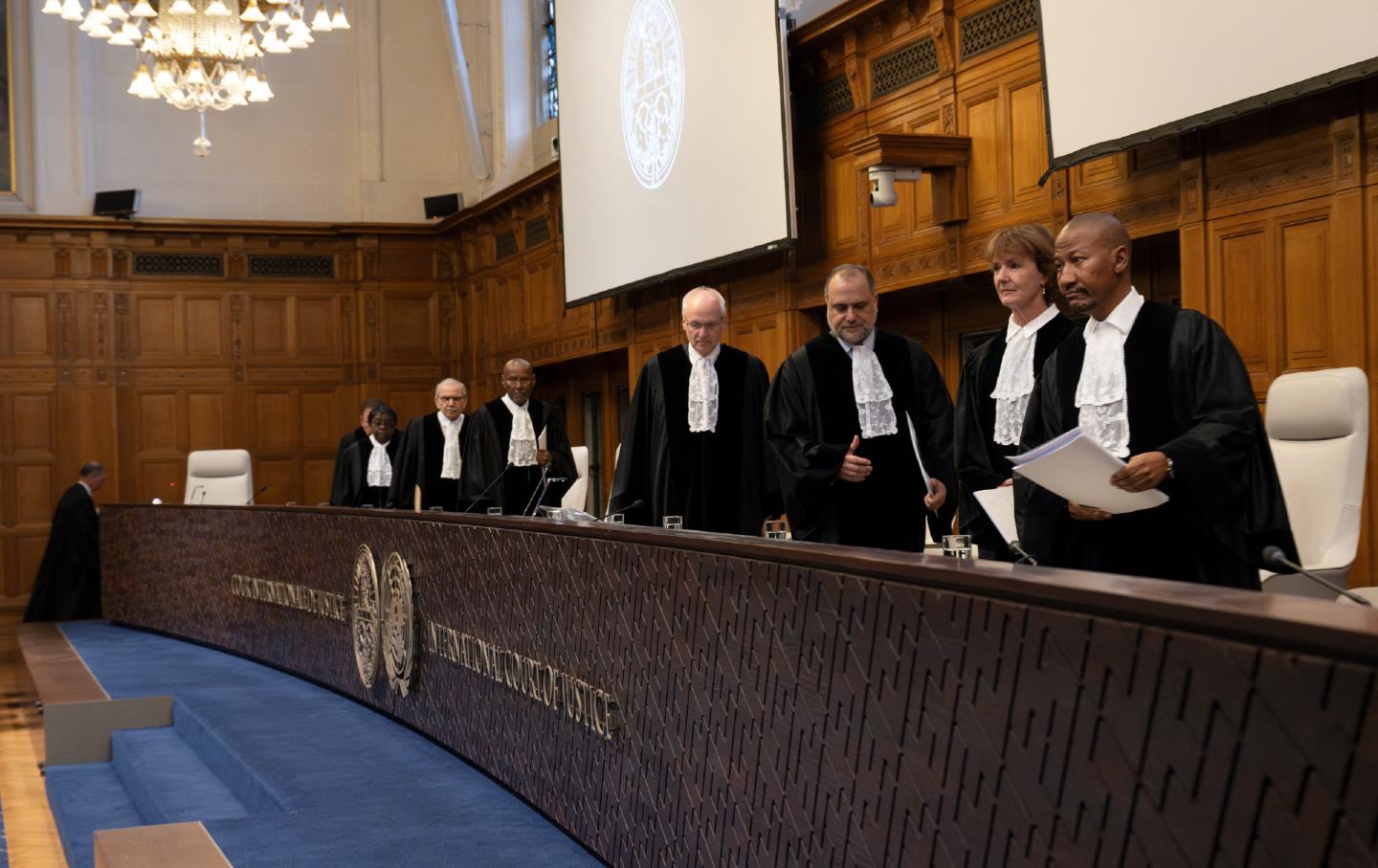 This image has an empty alt attribute; its file name is GettyImages-2153819012-1.jpg Magistrates arrive at the International Court of Justice to hear South Africa’s request for a Gaza cease-fire, in The Hague, on May 24, 2024.