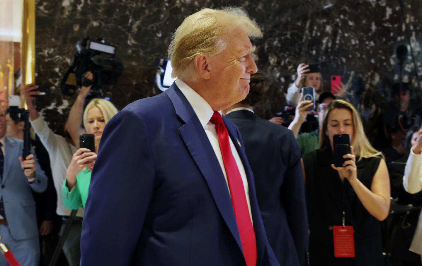 Former president Donald Trump enters a news conference at Trump Tower following the verdict in his hush-money trial at Trump Tower, on May 31, 2024, in New York City.