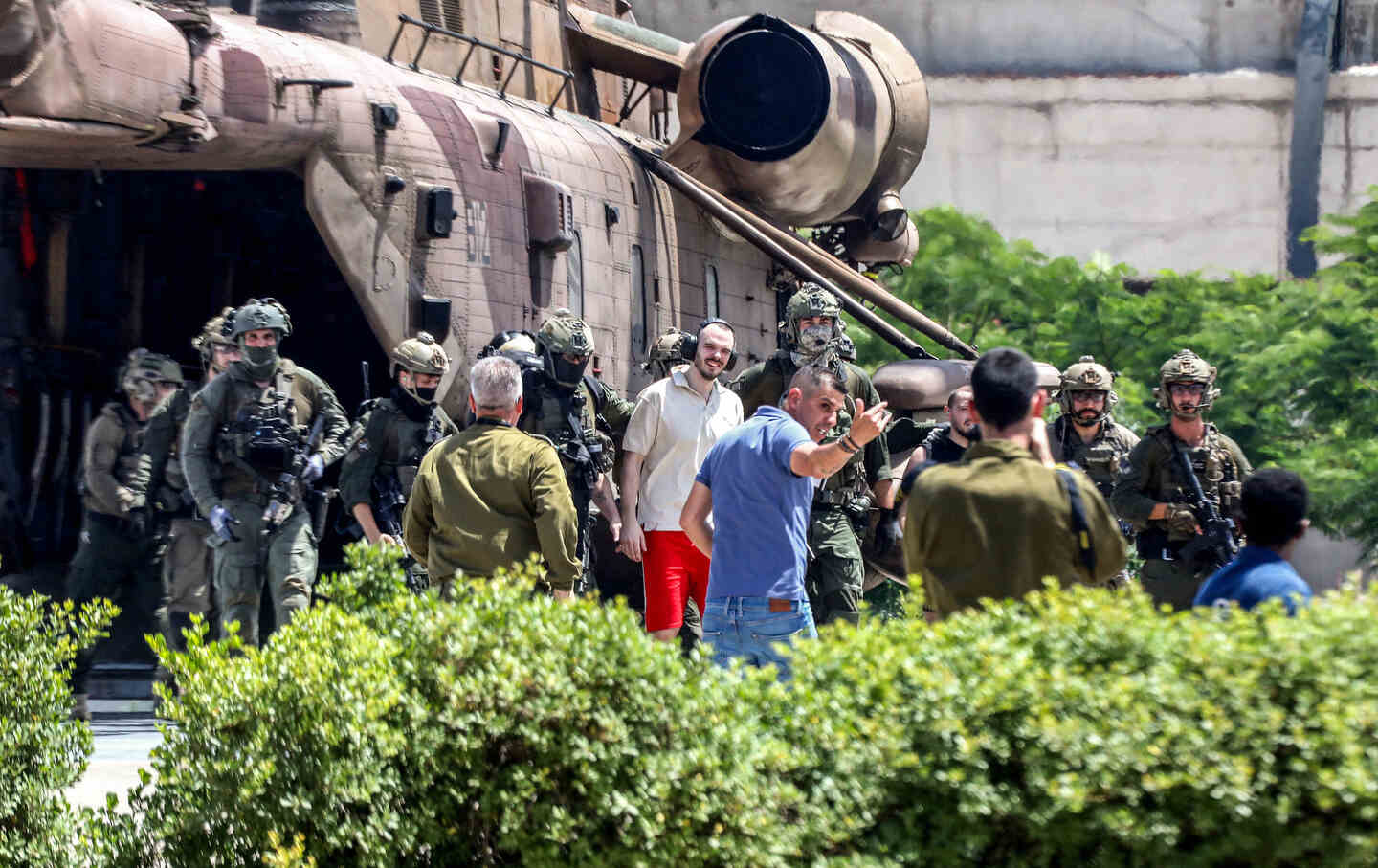 Israeli hostage Andrei Kozlov disembarks with soldiers from an air force CH-53 Sea Stallion military helicopter which landed in the grounds of the Sheba Medical Center, after his rescue by the Israeli army from captivity in the Gaza Strip, on June 8, 2024.