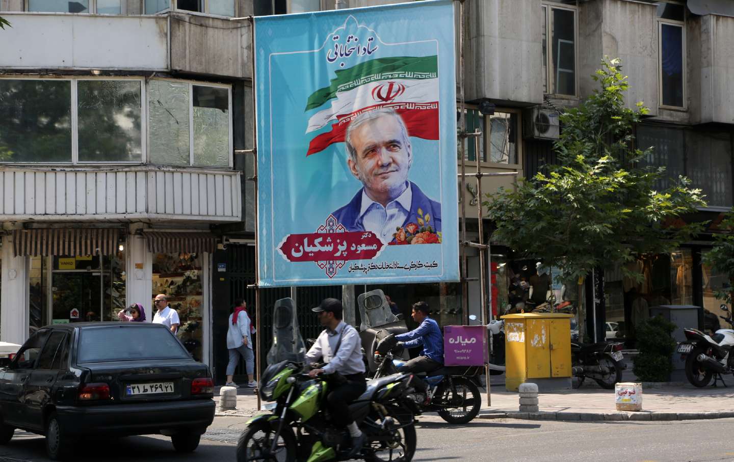 Posters of candidates are hung on streets in Tehran ahead of Iran's presidential elections scheduled to be held on June 28.