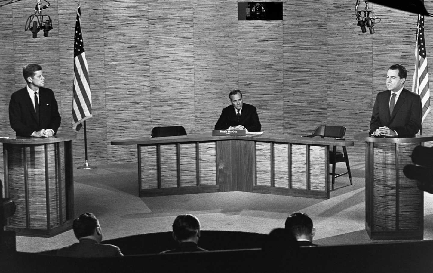 John F. Kennedy and Richard Nixon stand at the podium during one of the four debates in 1960.