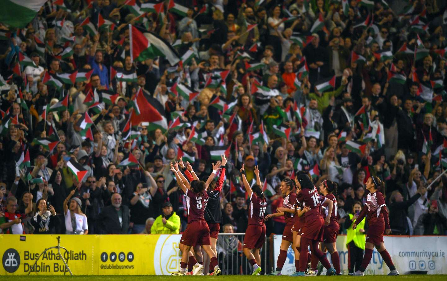 Palestinian players celebrate after Nour Youseff of Palestine scored his team's second goal during the international solidarity match between Bohemians and Palestine at Dalymount Park in Dublin on May 15, 2024.