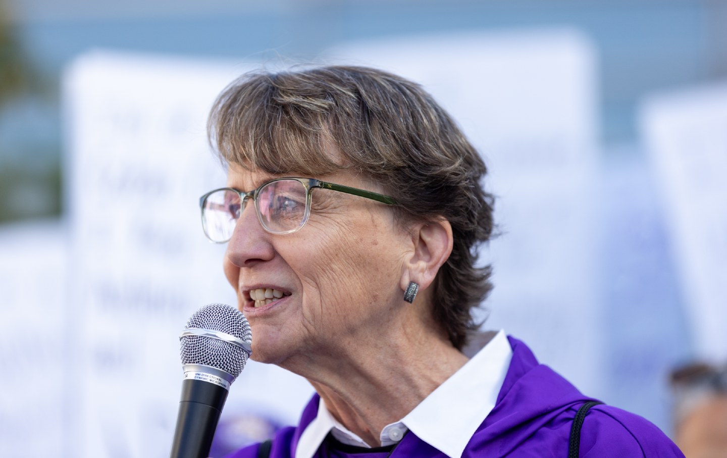 SEIU President Mary Kay Henry speaks to airport workers demanding Congress fix the air travel system at Ronald Reagan Washington National Airport on November 9, 2023, in Arlington, Virginia.