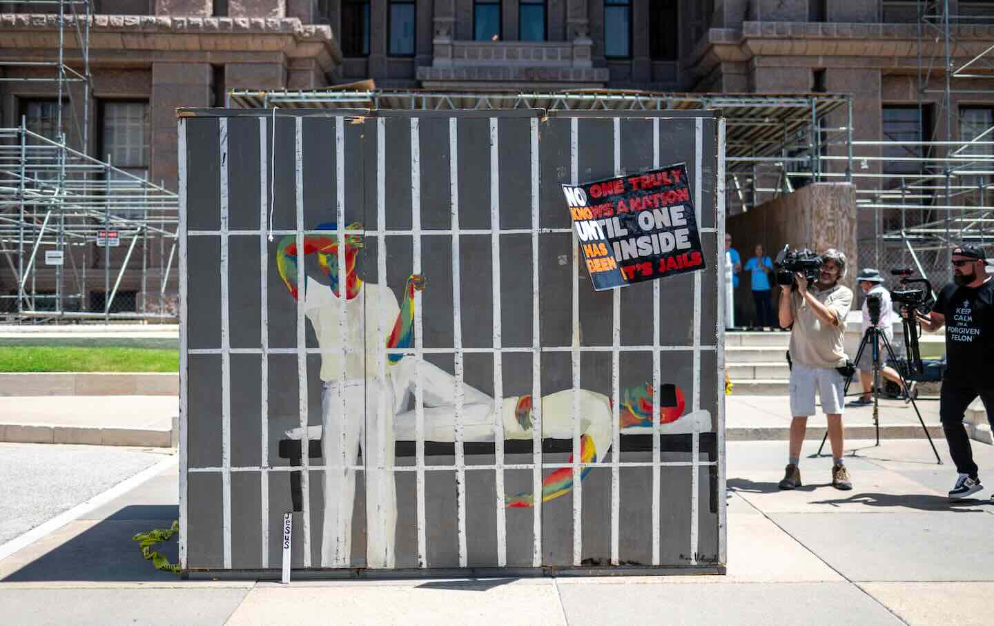 A mock prison cell, intended to simulate the heat inside prision cells in Texas, sits outside the Texas State Capitol in Austin on July 18, 2023. Activists visited the capitol to discuss the need for air-conditioning in Texas state prisons.