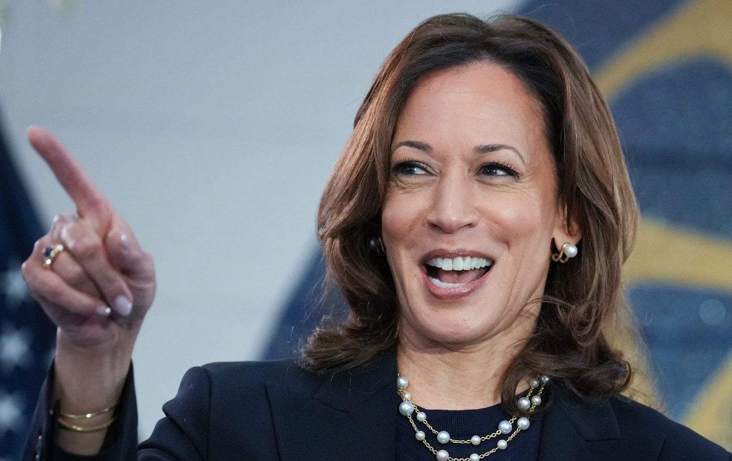 Kamala Harris giving a speech and smiling