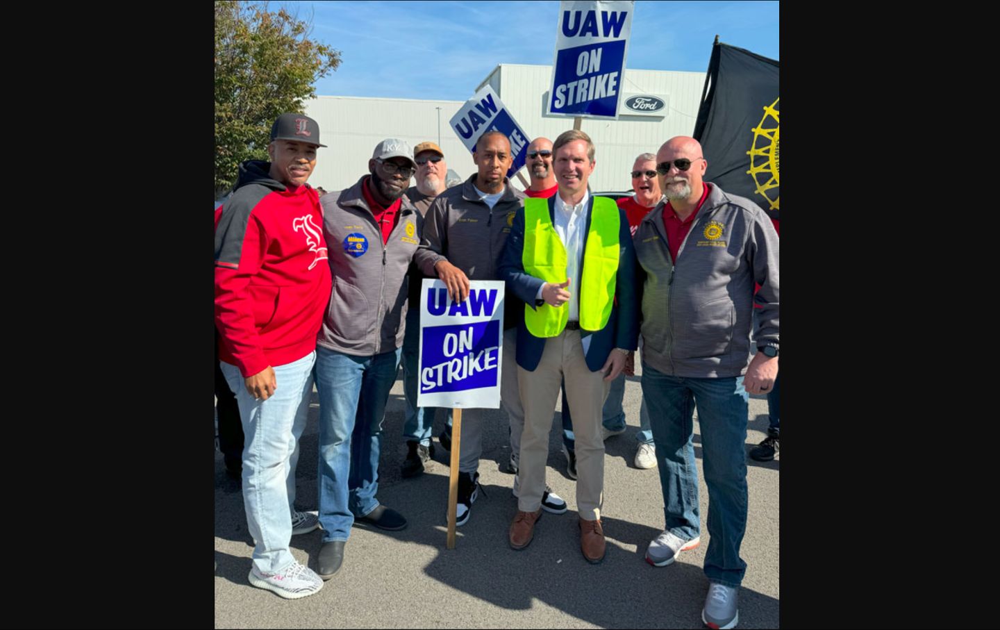 Andy Beshear visits striking UAW workers on the picket line in Louisville, Kentucky, on October 18, 2023.