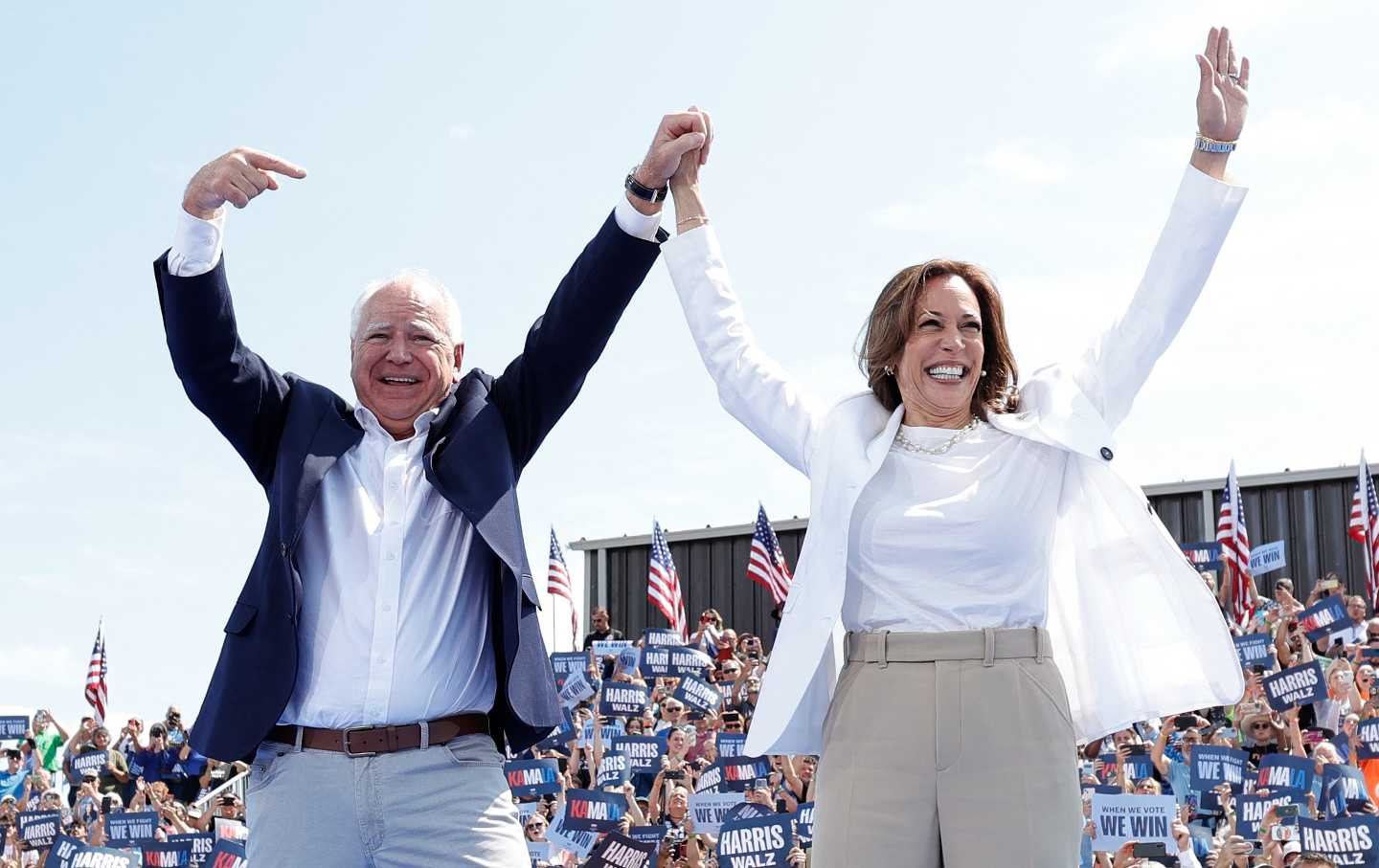 Democratic presidential candidate Vice President Kamala Harris and her running mate, Minnesota Governor Tim Walz, greet supporters.