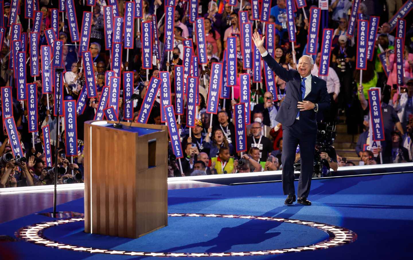 Minnesota Governor Tim Walz arrives to speak on stage during the third day of the Democratic National Convention at the United Center on August 21, 2024, in Chicago.