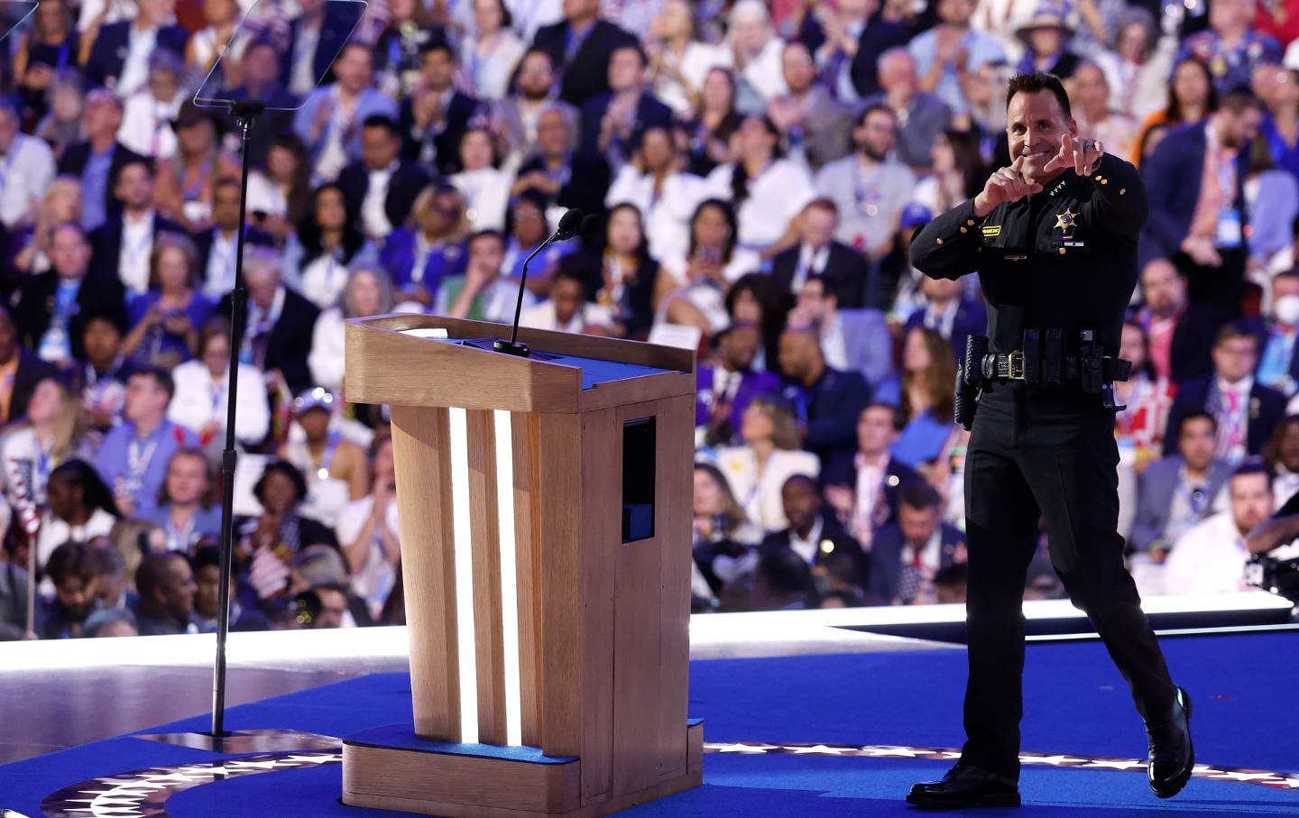 Chris Swanson, Sheriff of Genesee County, Michigan, speaks onstage during the final day of the Democratic National Convention at the United Center on August 22, 2024, in Chicago.