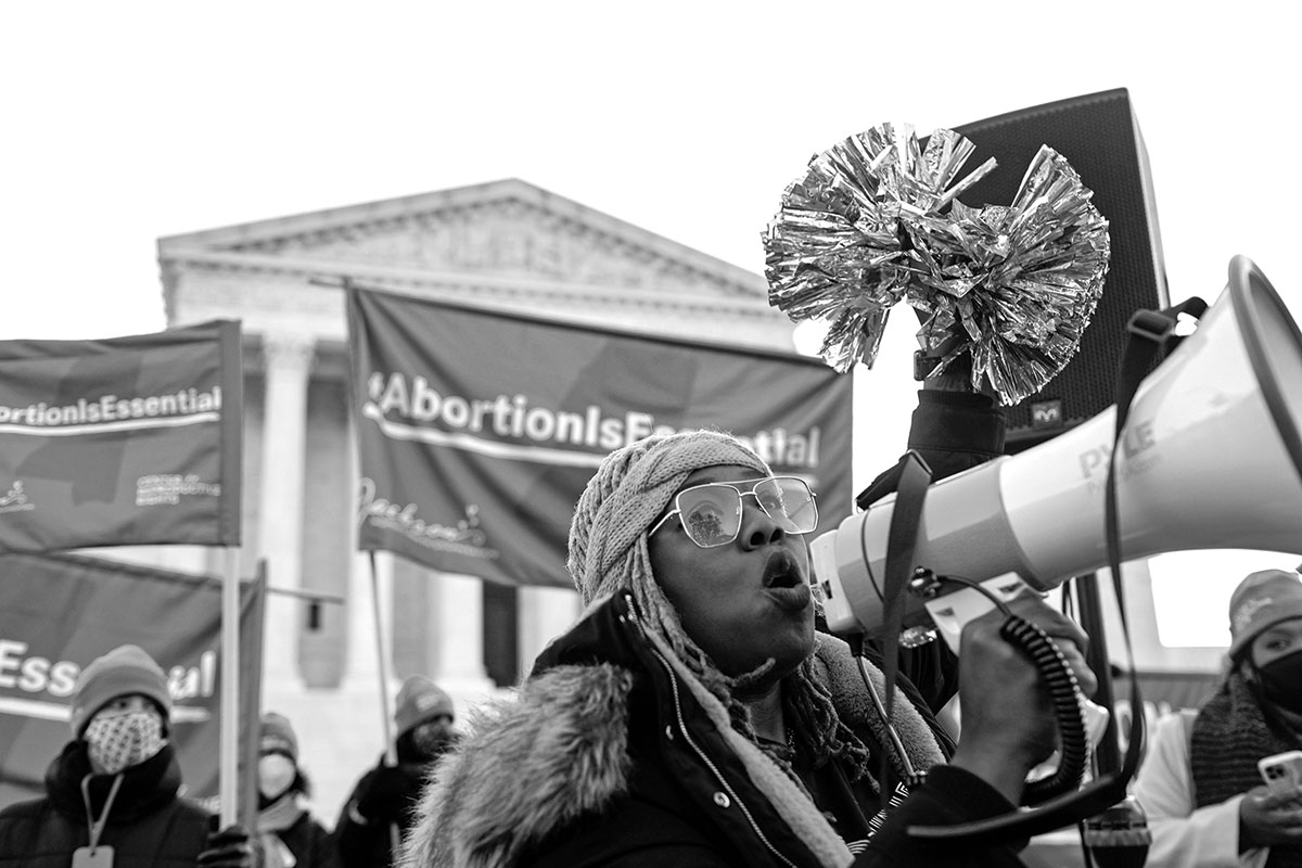 A protester leads a chant in response to the Dobbs v. Jackson Women’s Health Organization ruling in June 2022.