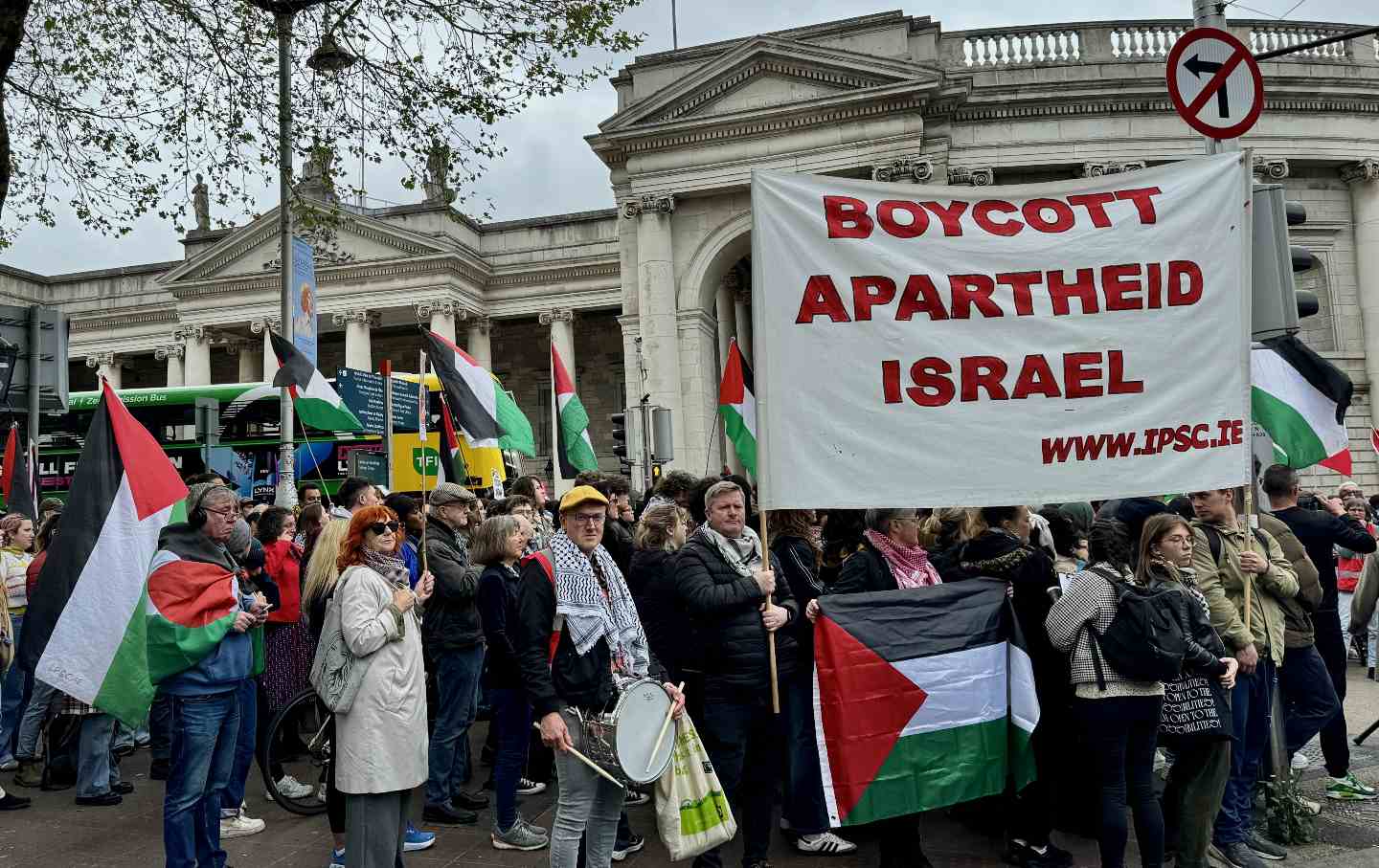 People organize a pro-Palestinian protest outside Trinity College Dublin.