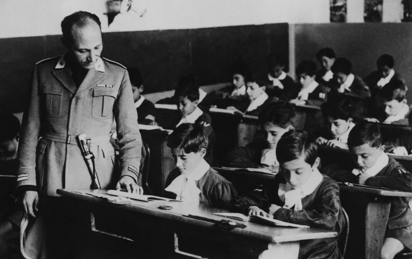 An Italian fascist in a classroom in Italy in 1930.