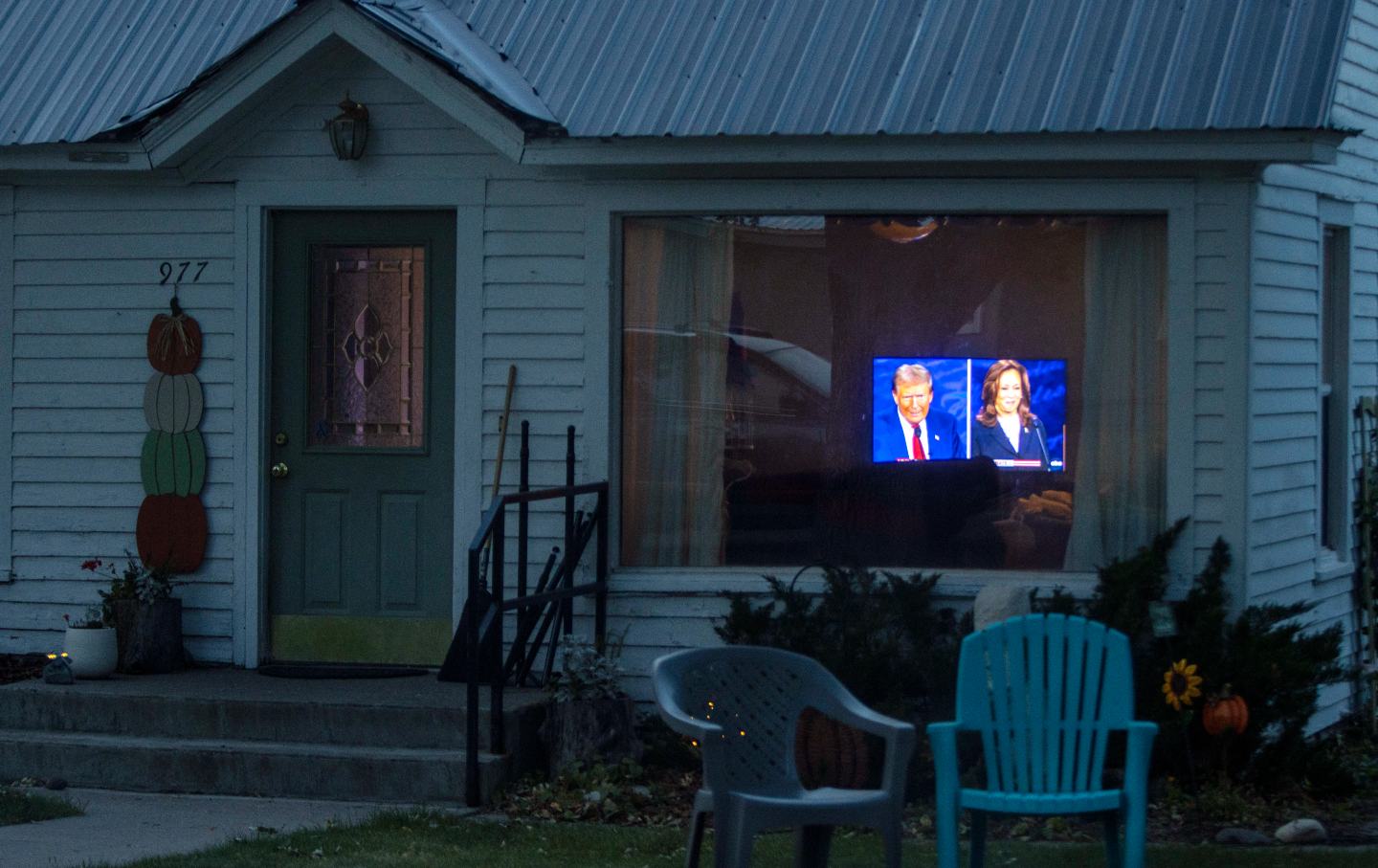 A television showing Democratic presidential nominee Vice President Kamala Harris debating Republican presidential nominee former president Donald Trump is seen playing in a living room on September 10, 2024, in Ashton, Idaho.