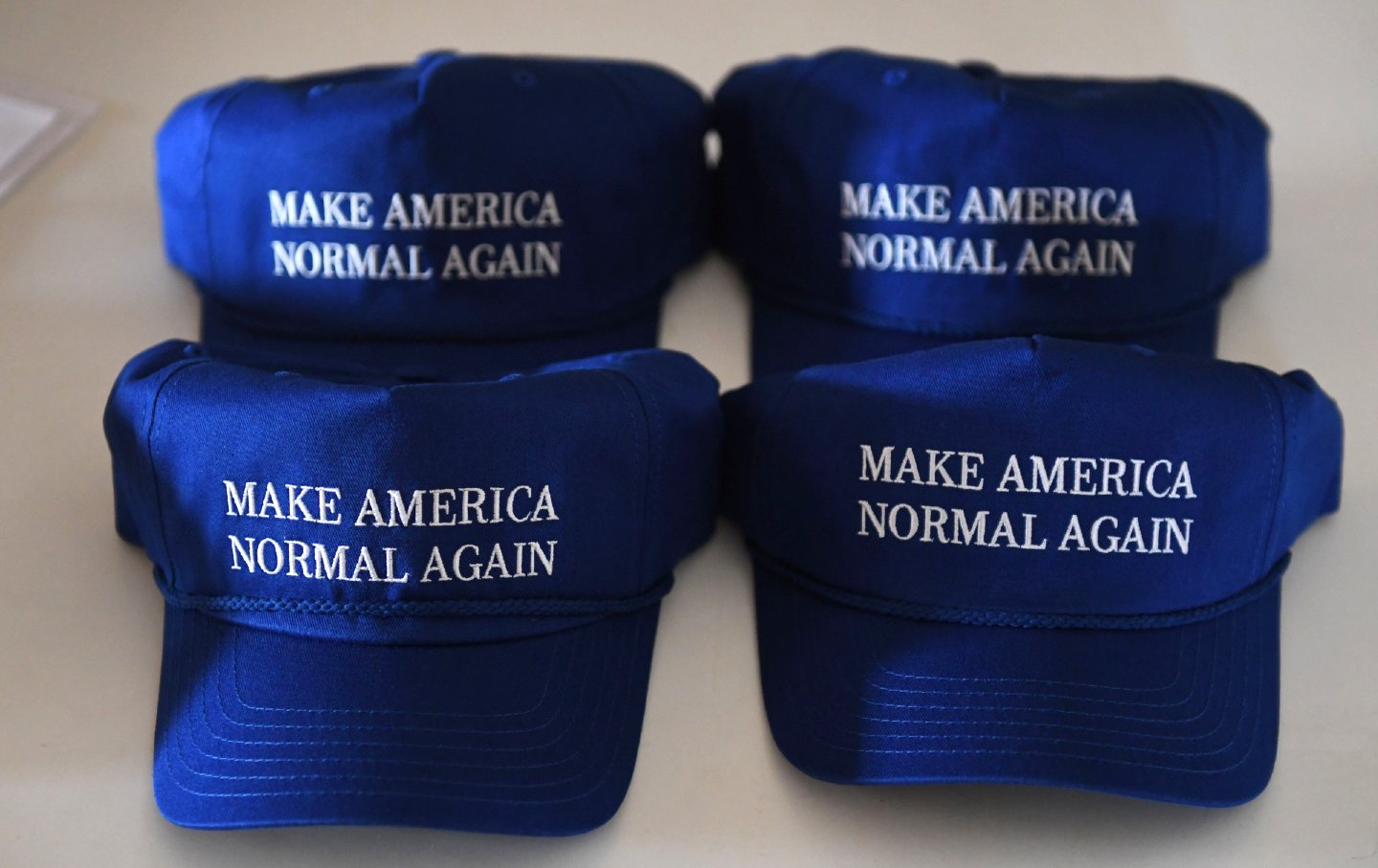 “Make America Normal Again” hats are displayed in Albuquerque, New Mexico, on October 1, 2018.