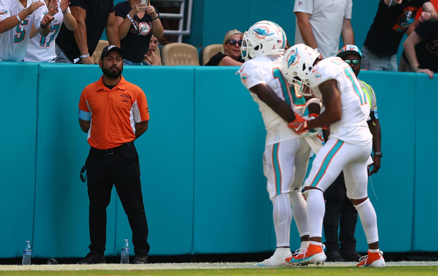 Tyreek Hill #10 of the Miami Dolphins and Jaylen Waddle #17 celebrate after Hill's receiving touchdown on September 8, 2024 in Miami Gardens, Florida. Prior to the game, Miami-Dade police pushed Hill face down on the concrete and handcuffed him.