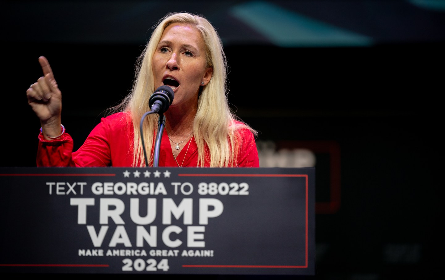 Rep. Marjorie Taylor Greene (R-Ga.) speaks prior to the arrival of Donald Trump during a campaign rally at the Johnny Mercer Theater on September 24, 2024 in Savannah, Georgia.