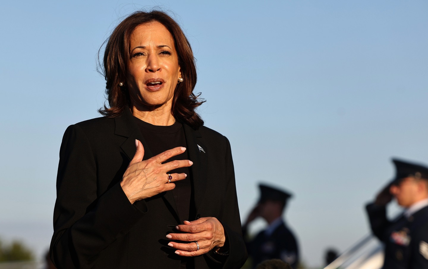 Kamala Harris speaks to the media before boarding Air Force Two after assessing the Hurricane Helene recovery response in North Carolina on October 5, 2024, in Charlotte, North Carolina.