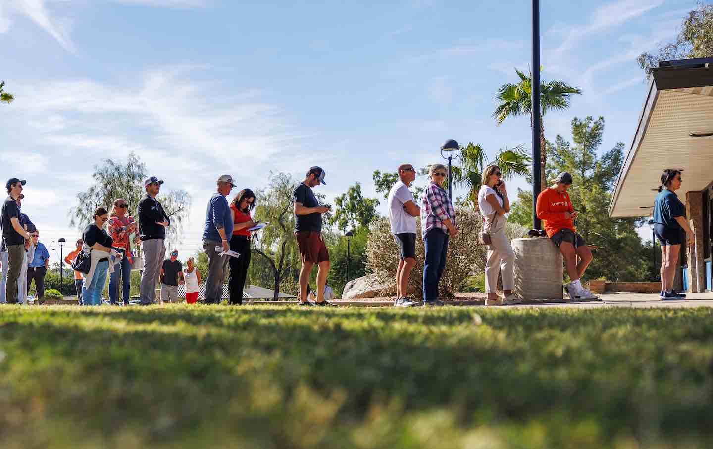 Arizona residents wait in line to vote early at the Indian Bend Wash Visitor Center on October 30, 2024, in Scottsdale, Arizona.