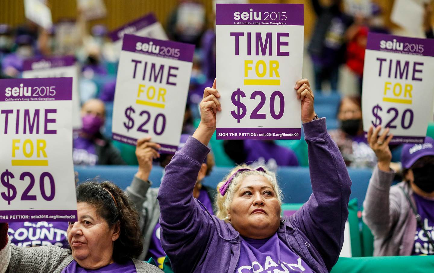 Protesters at a Los Angeles County Board of Supervisors meeting demanding higher wages.