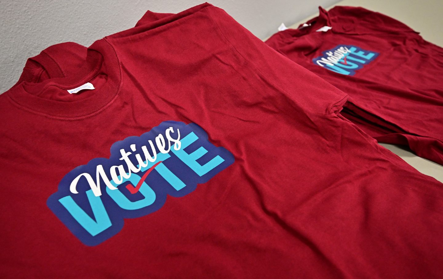 T-shirts reading “Natives Vote” are pictured at the Walker River Paiute Reservation's administrative offices in Schurz, Nevada, on October 16, 2024.