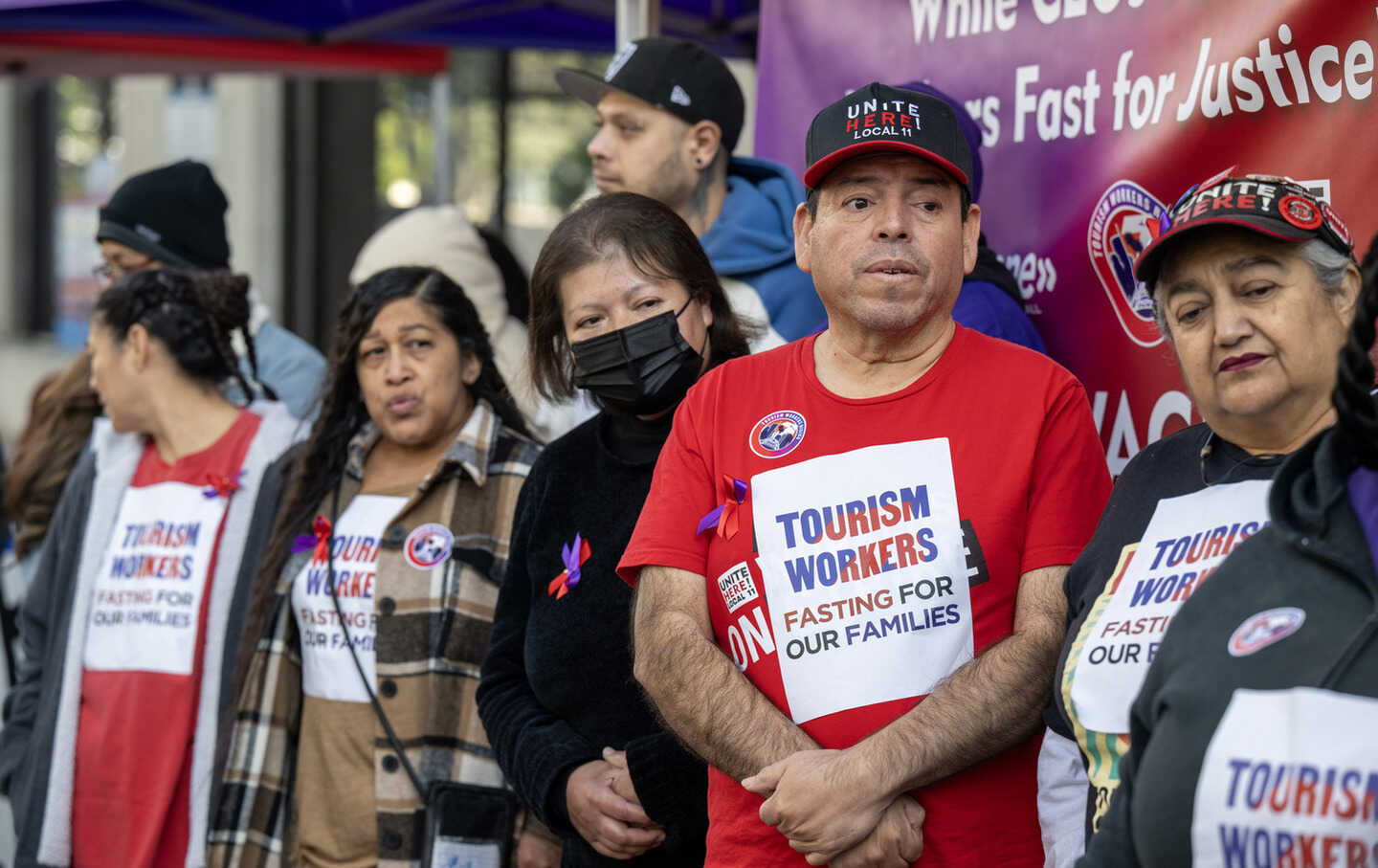 Several airport and hotel workers begin a three-day hunger strike outside of Los Angeles City Hall, on Monday, December 9, 2024.