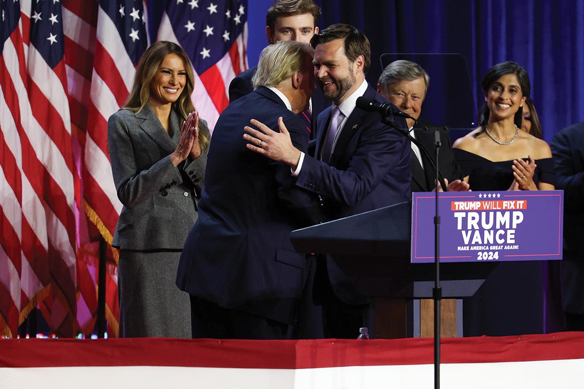 Donald Trump hugs JD Vance at an election night event in West Palm Beach, Florida.