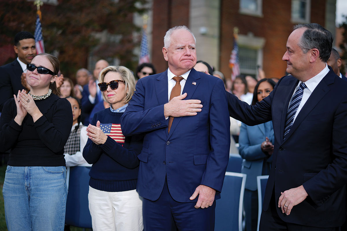 Tim Walz and his wife, Gwen, react after Kamala Harris concedes the election at Howard University.