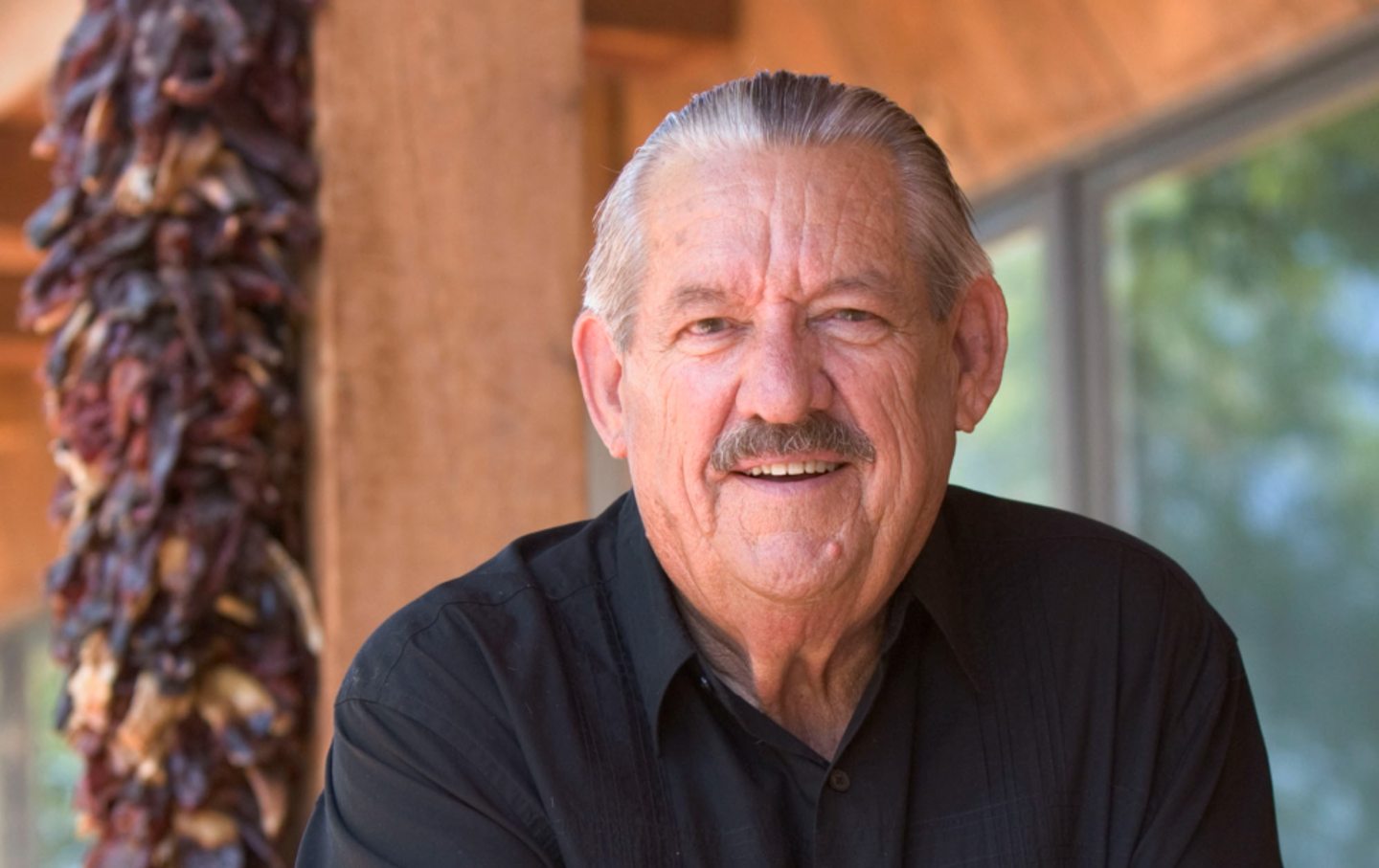 Former Oklahoma senator Fred Harris stands outside his Corrales, New Mexico, home, Friday, July 23, 2004.