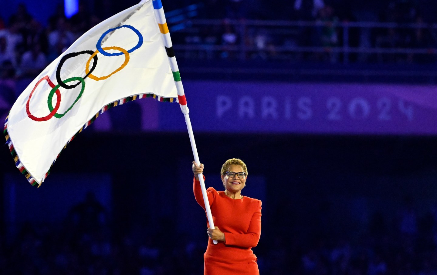 Los Angeles Mayor Karen Bass receives the Olympic flag during the closing ceremonies of the Paris 2024 Olympic Games in Saint-Denis on August 11, 2024.