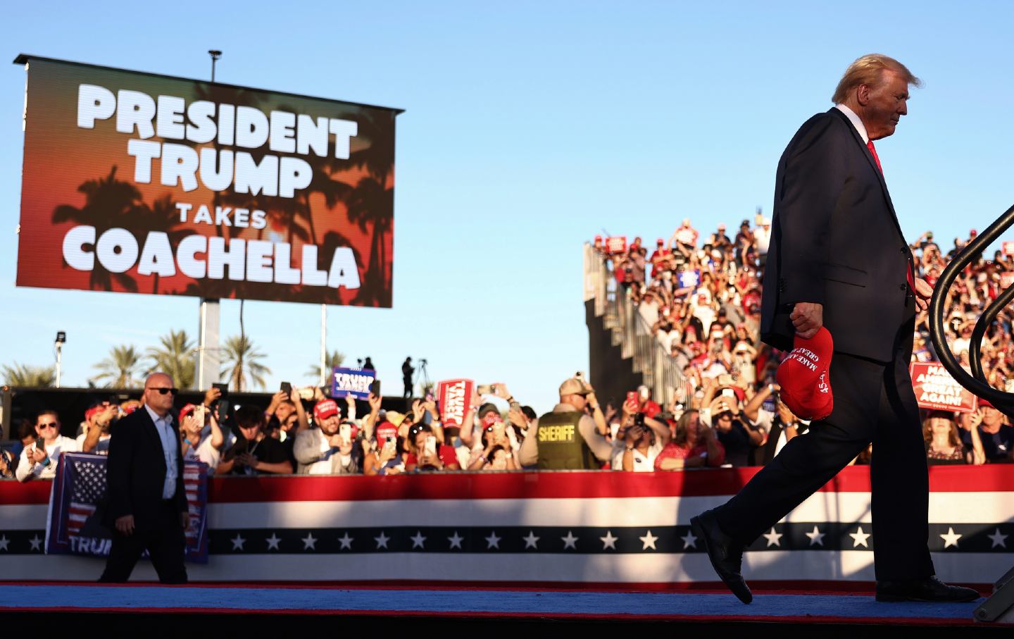 Donald Trump walks onstage for a campaign rally on October 12, 2024, in Coachella, California.