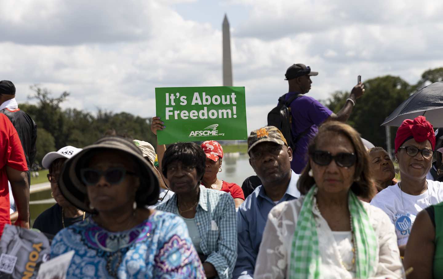 Demonstrators march on the 60th anniversary of the March On Washington and Martin Luther King Jr's historic 