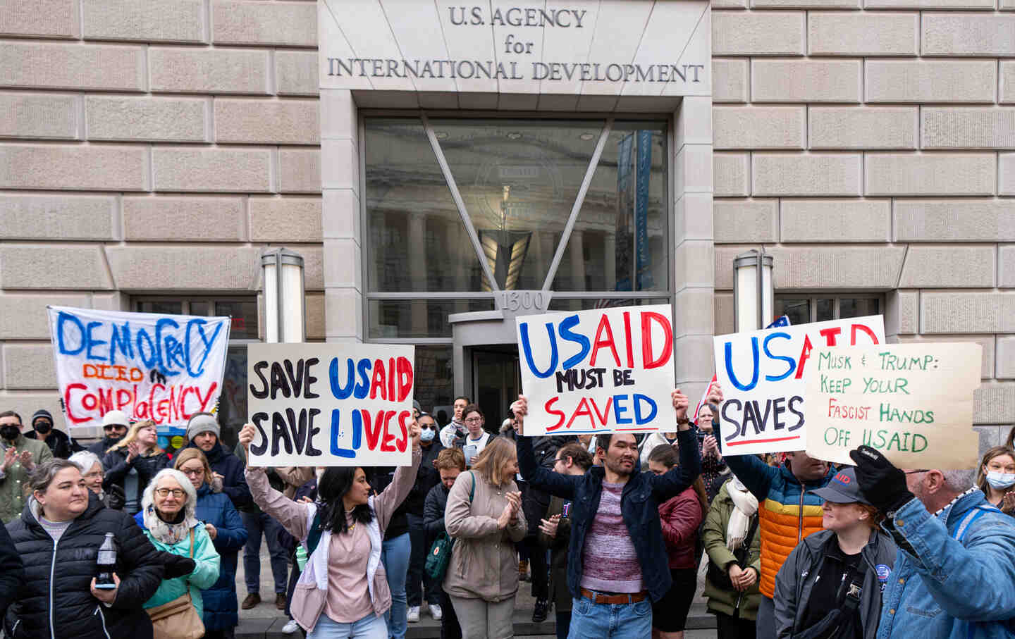 Employees and supporters protest outside the headquarters for United States Agency for International Development (USAID), on Monday, February 3, 2025, after Elon Musk posted on social media that he and President Donald Trump would shut down the agency.