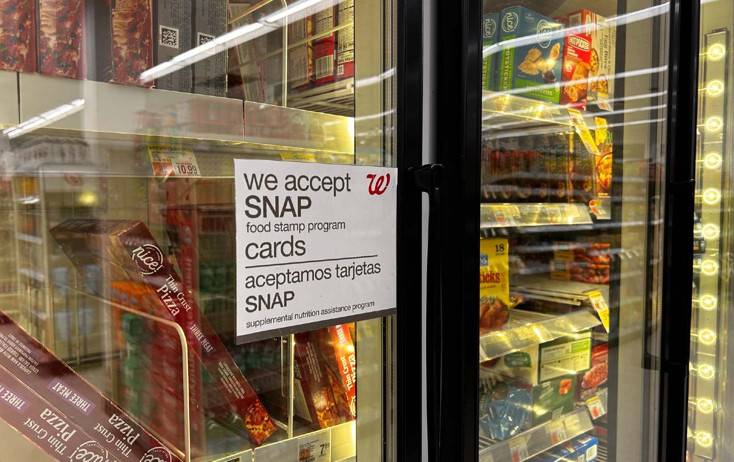 A sign on the door of a Walgreens refrigerator in Queens, New York.