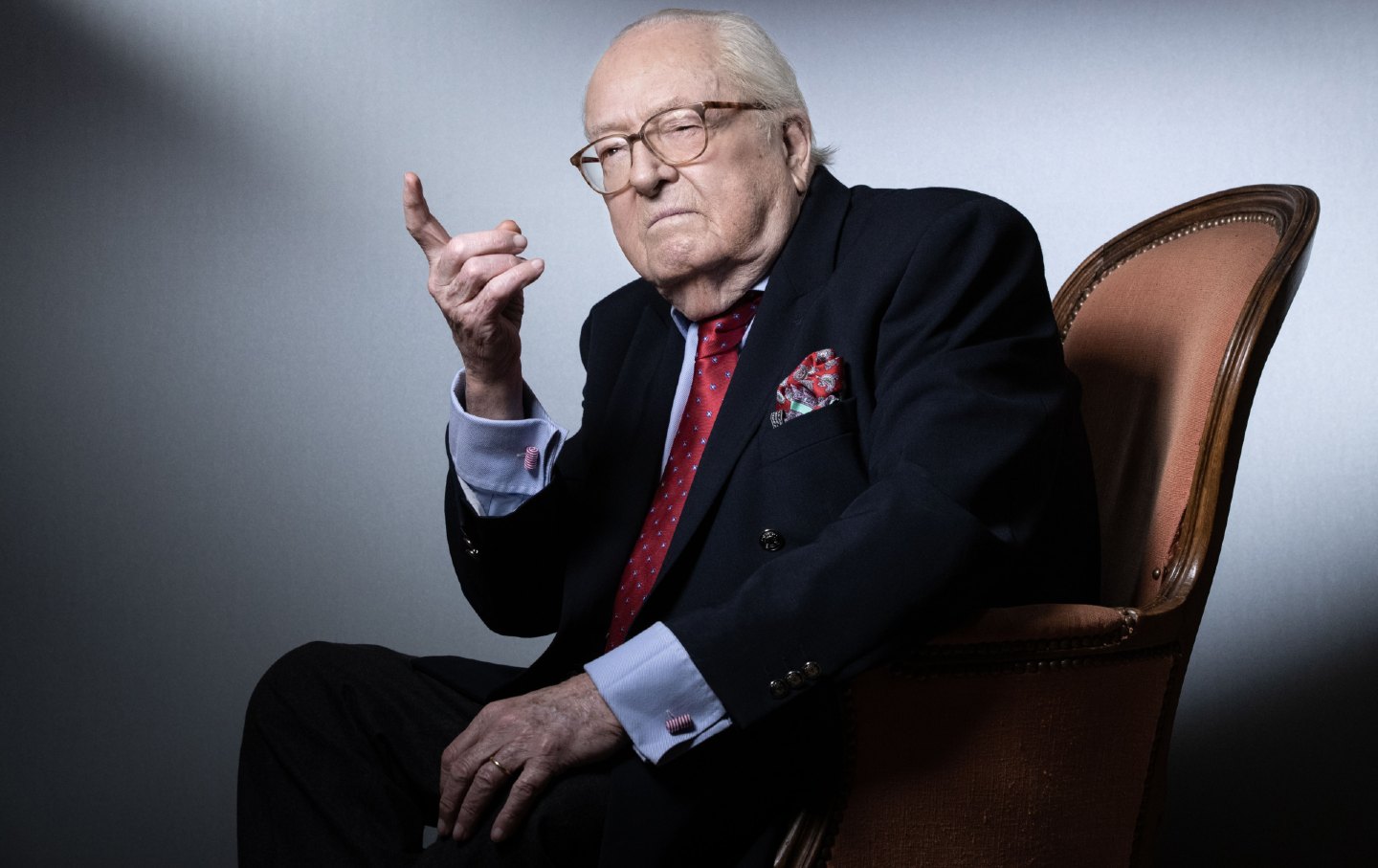 Founder of the far-right National Front party Jean-Marie Le Pen points his finger as he poses during a photo session at his home in Saint-Cloud on January 14, 2021.