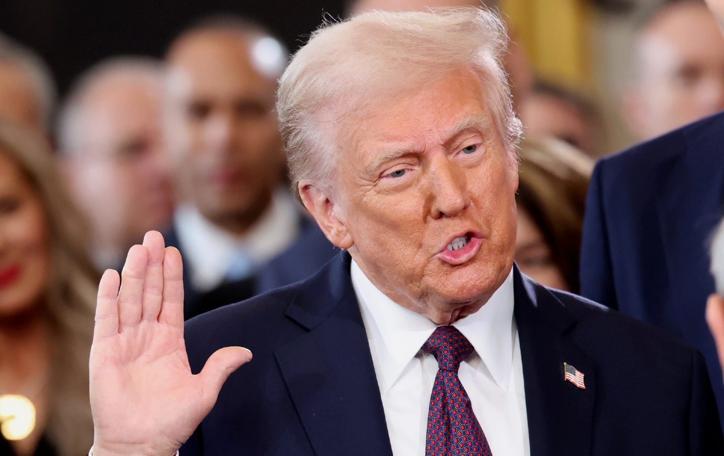 President-elect Donald Trump takes the oath of office during the 60th Presidential Inauguration in the Rotunda of the US Capitol in Washington, DC, on January 20, 2025.