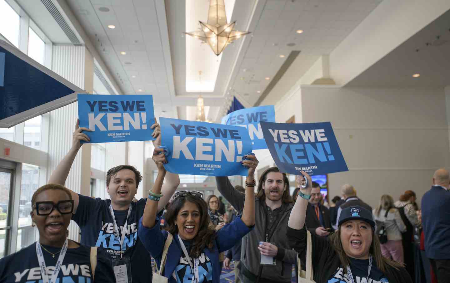 Supporters and volunteers of DNC chair candidate Ken Martin cheer outside of the ballroom in the hours prior to the votes for positions at the Democratic National Committee Winter Meeting at the Gaylord National Resort and Convention Center in National Harbor, Maryland, Saturday, February 1, 2025.