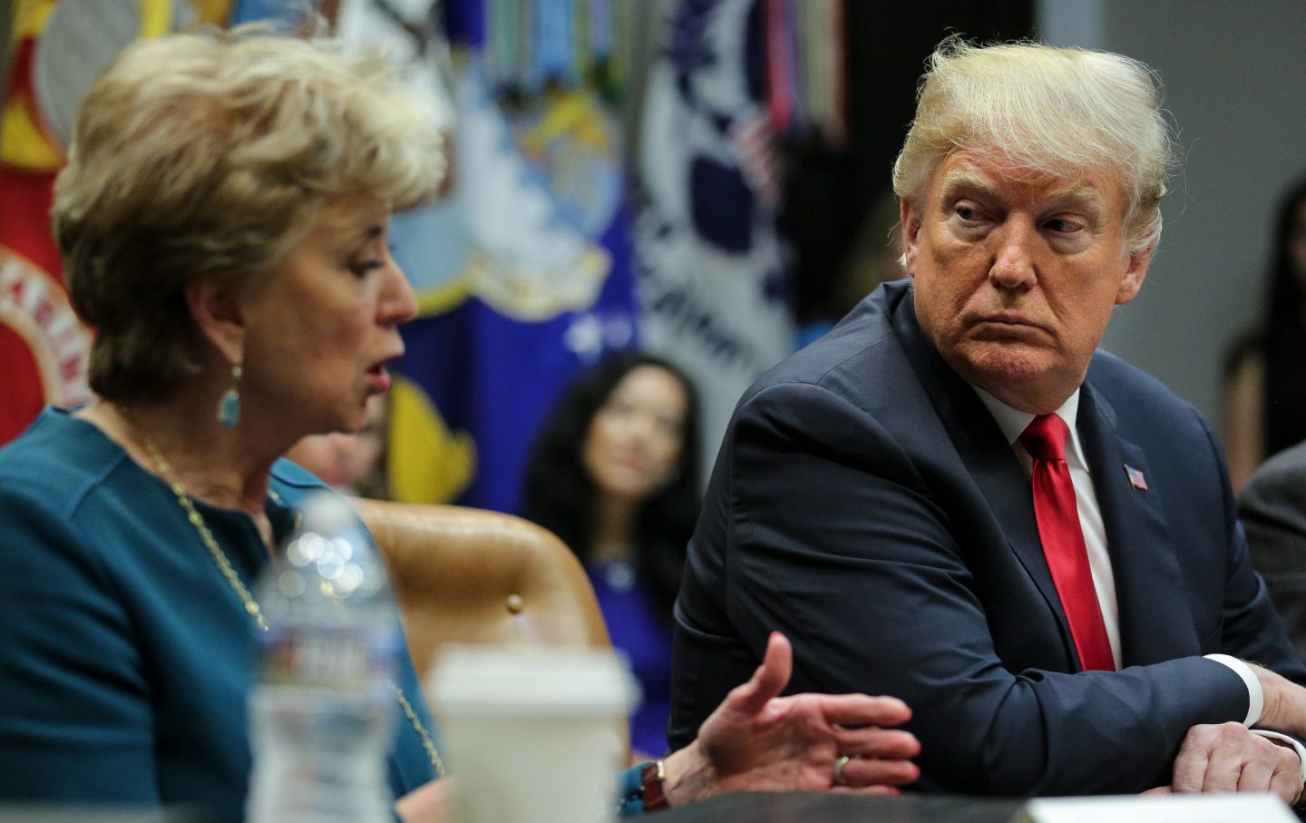 Linda McMahon and Donald Trump listens during the inaugural meeting of the President’s National Council for the American Worker in 2018.