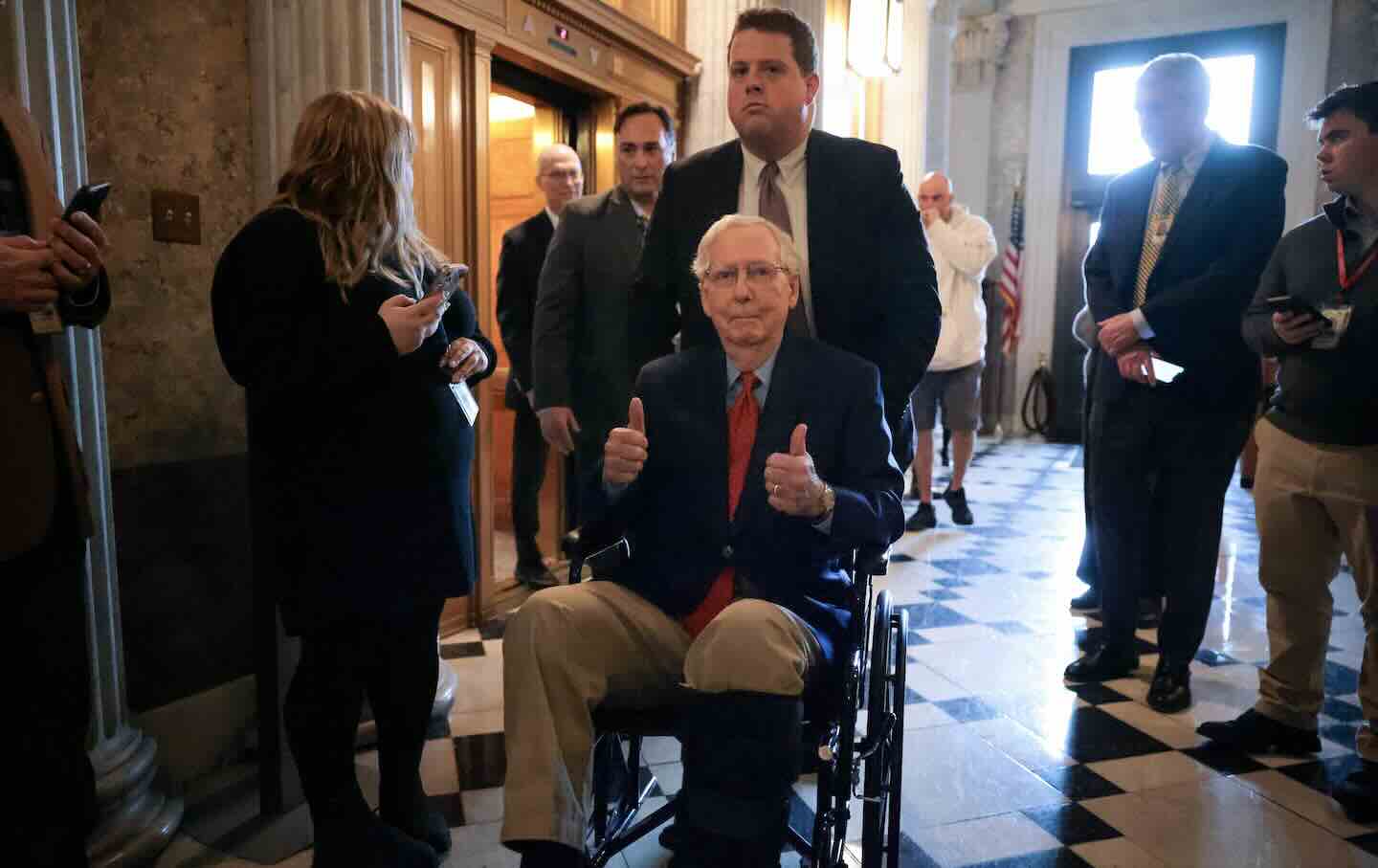 US Senator Mitch McConnell (R-KY) gives a thumbs up while arriving at the nomination of Tulsi Gabbard as President Donald Trump’s director of national intelligence at the Senate Chambers on February 12, 2025, in Washington, DC.