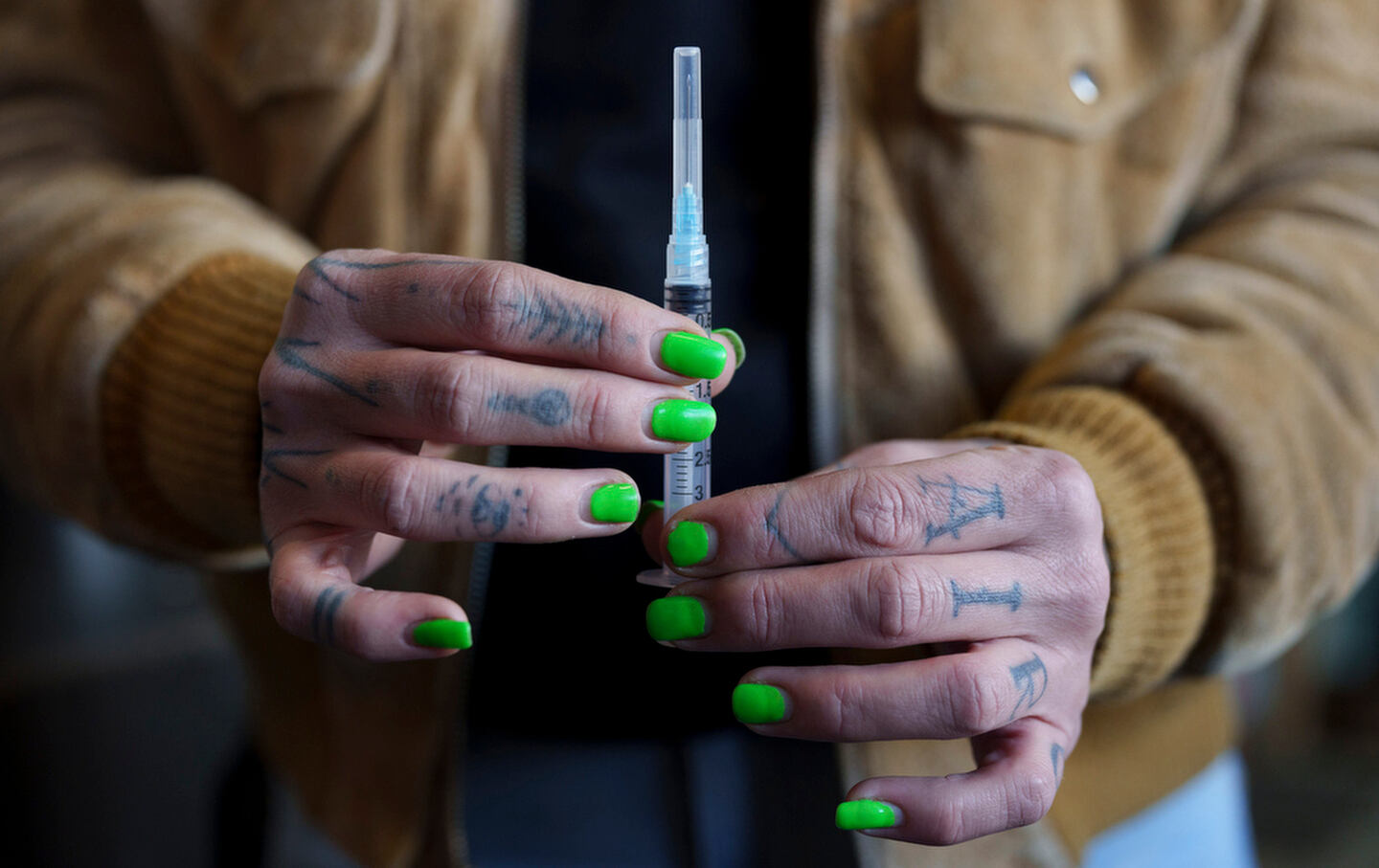 Longtime Southside Harm Reduction Services employee and volunteer Marissa Bonnie displays a syringe used to administer Naloxone, a highly effective overdose reversal drug.