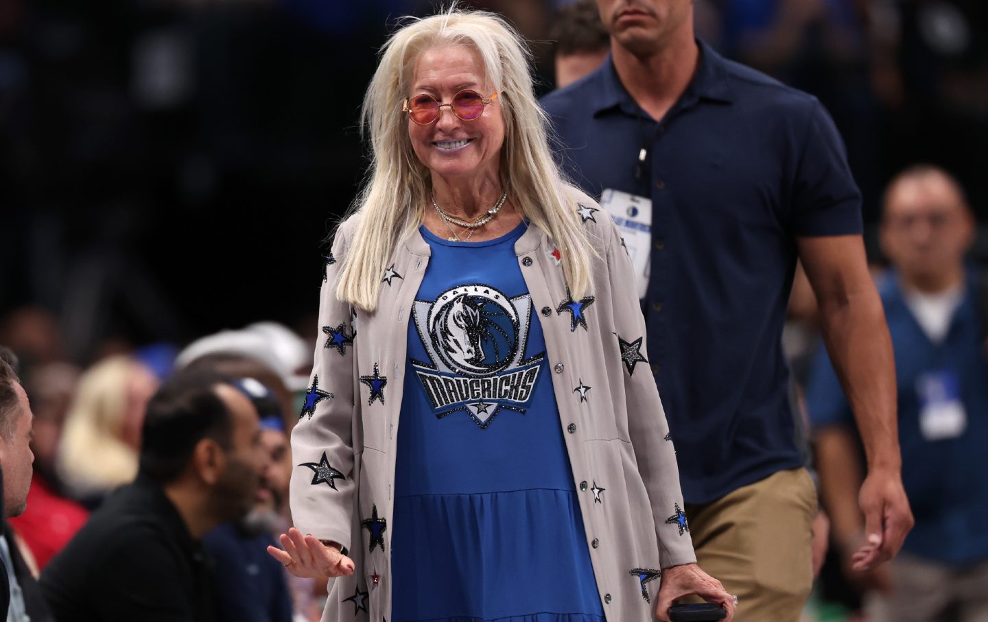 Miriam Adelson courtside in Dallas Mavericks merchandise.